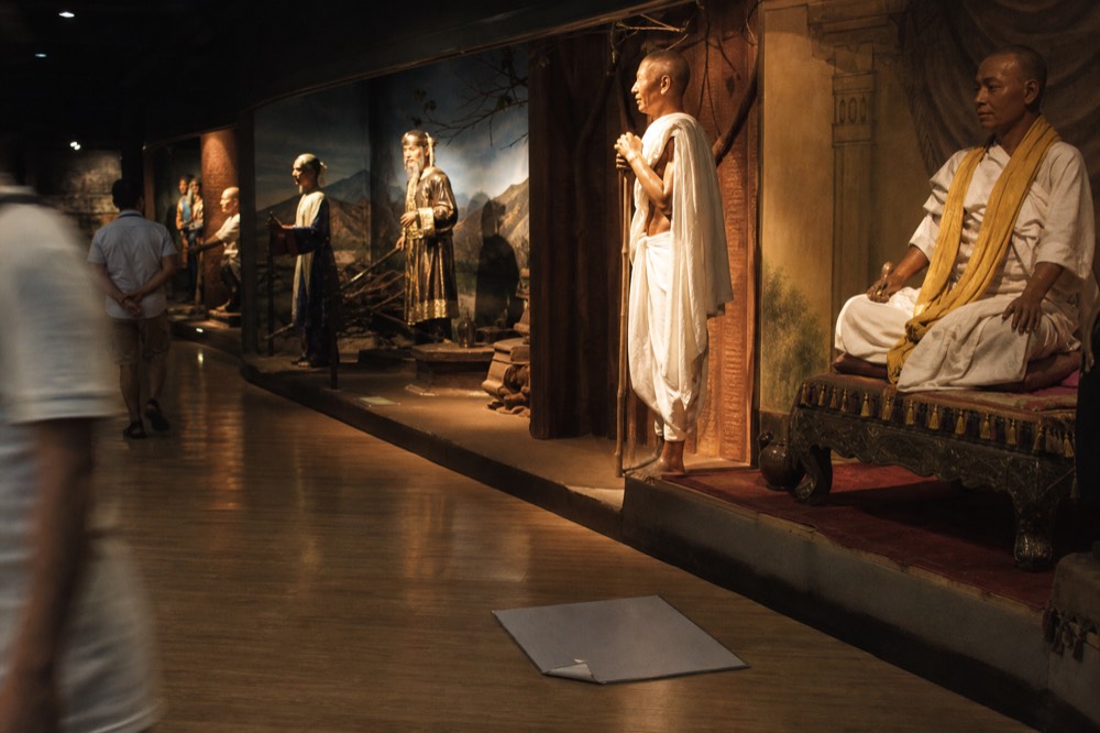 Wax figures in themed sets at Madame Tussauds Bangkok, no text, no logos, no people